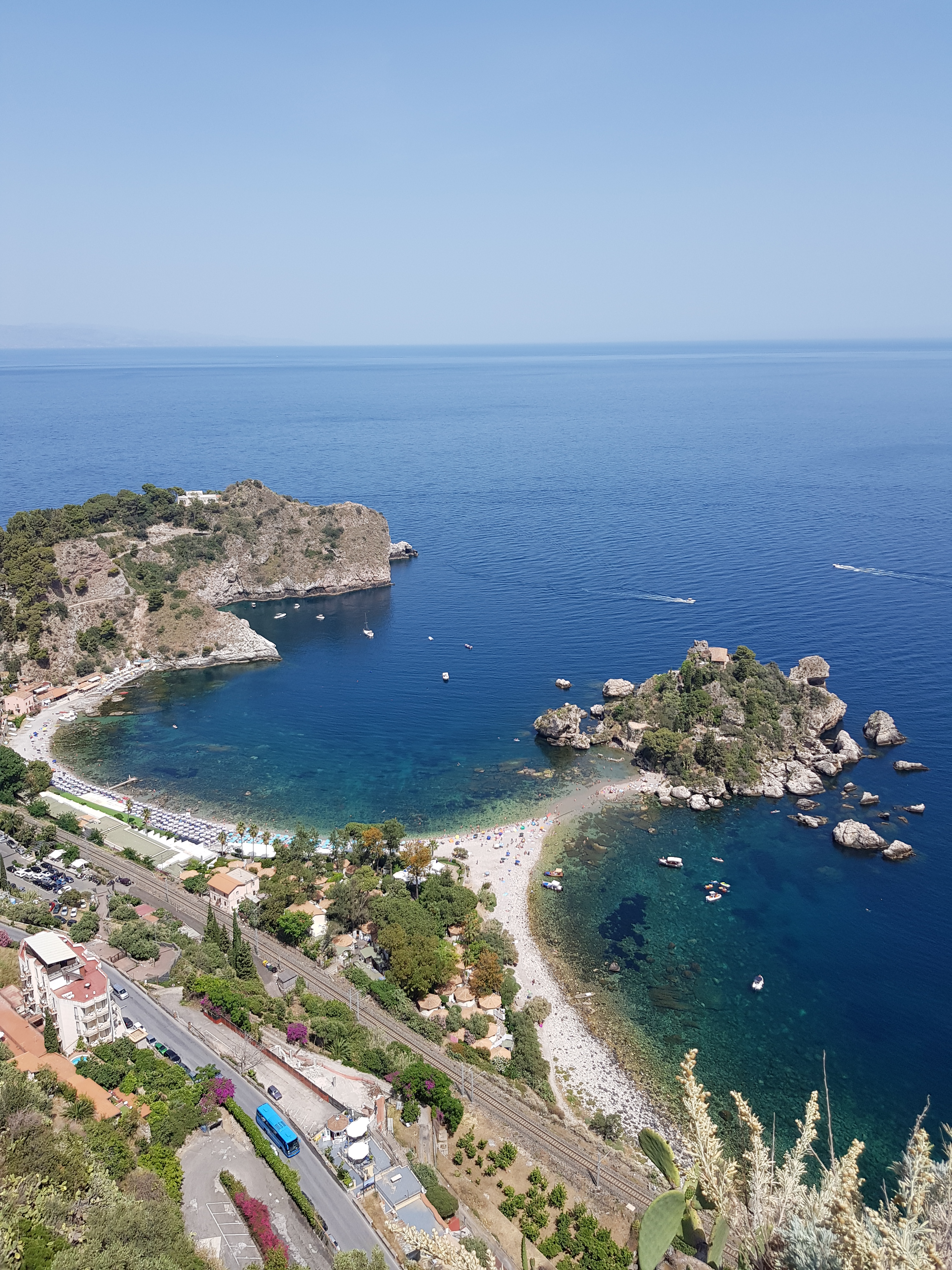 Isola Bella, Taormina, Sicily - beach, turquoise water, greenery, perfect for digital nomads Italy.