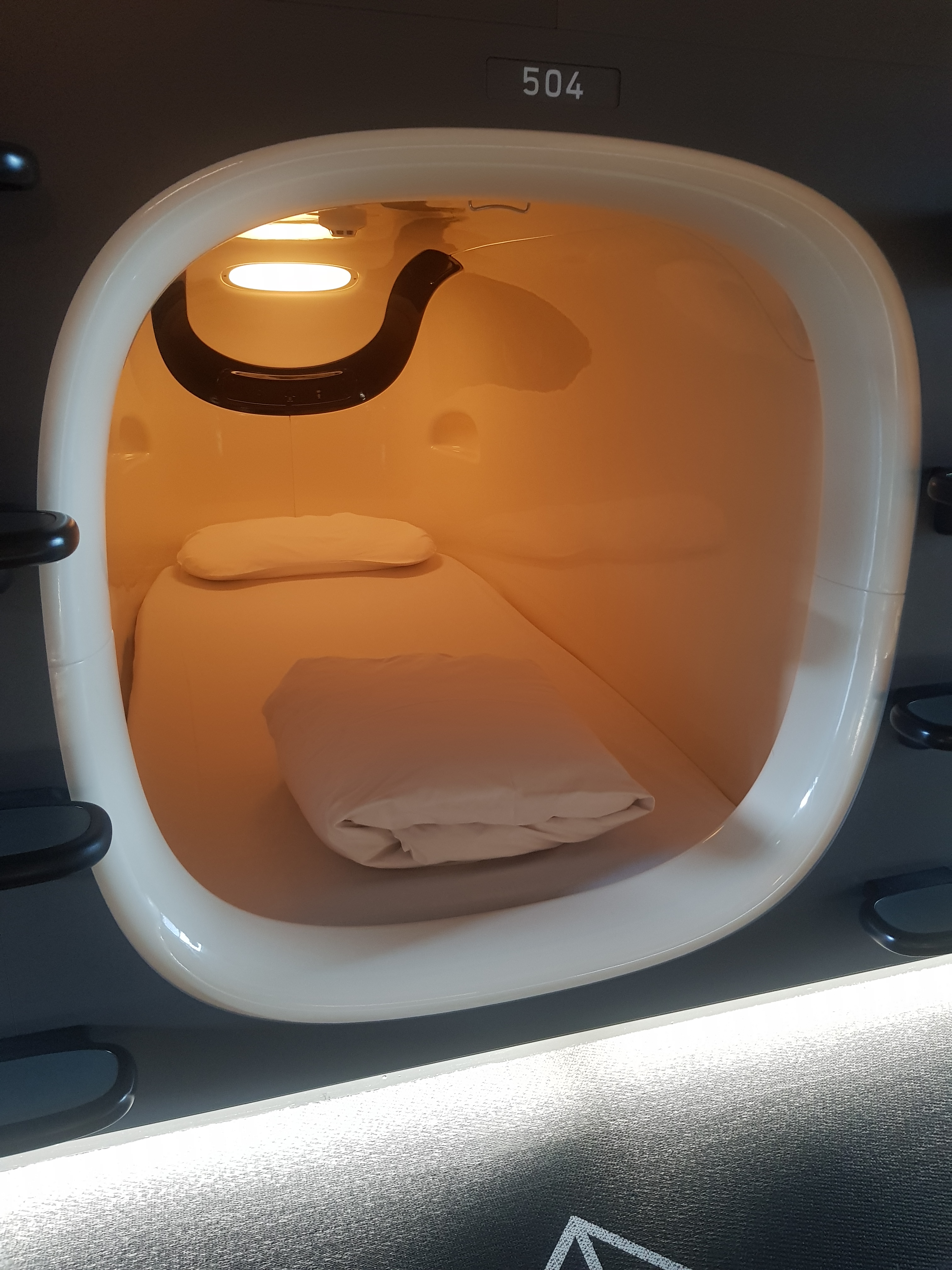 Capsule hotel in Japan for digital nomads - affordable accommodation option for solo travelers.