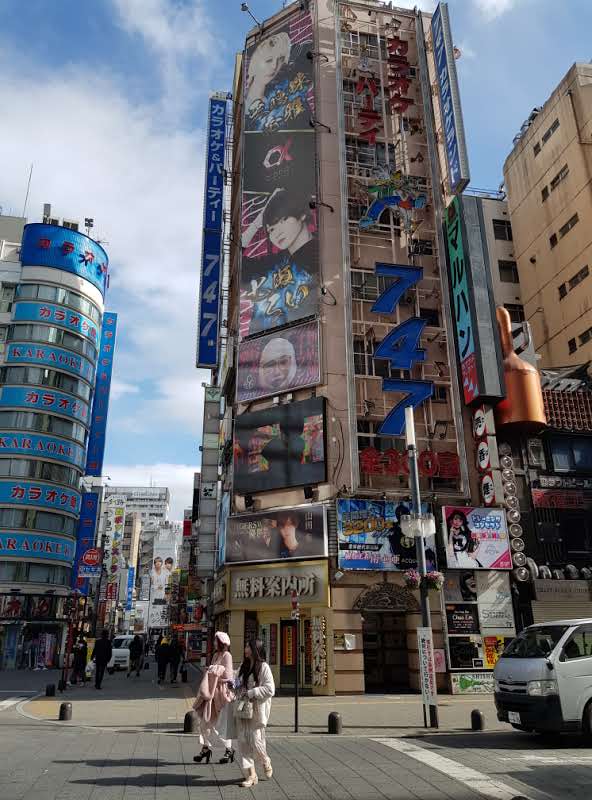 Bustling street in Tokyo, Japan - ideal for digital nomads seeking vibrant city life and coworking spaces.