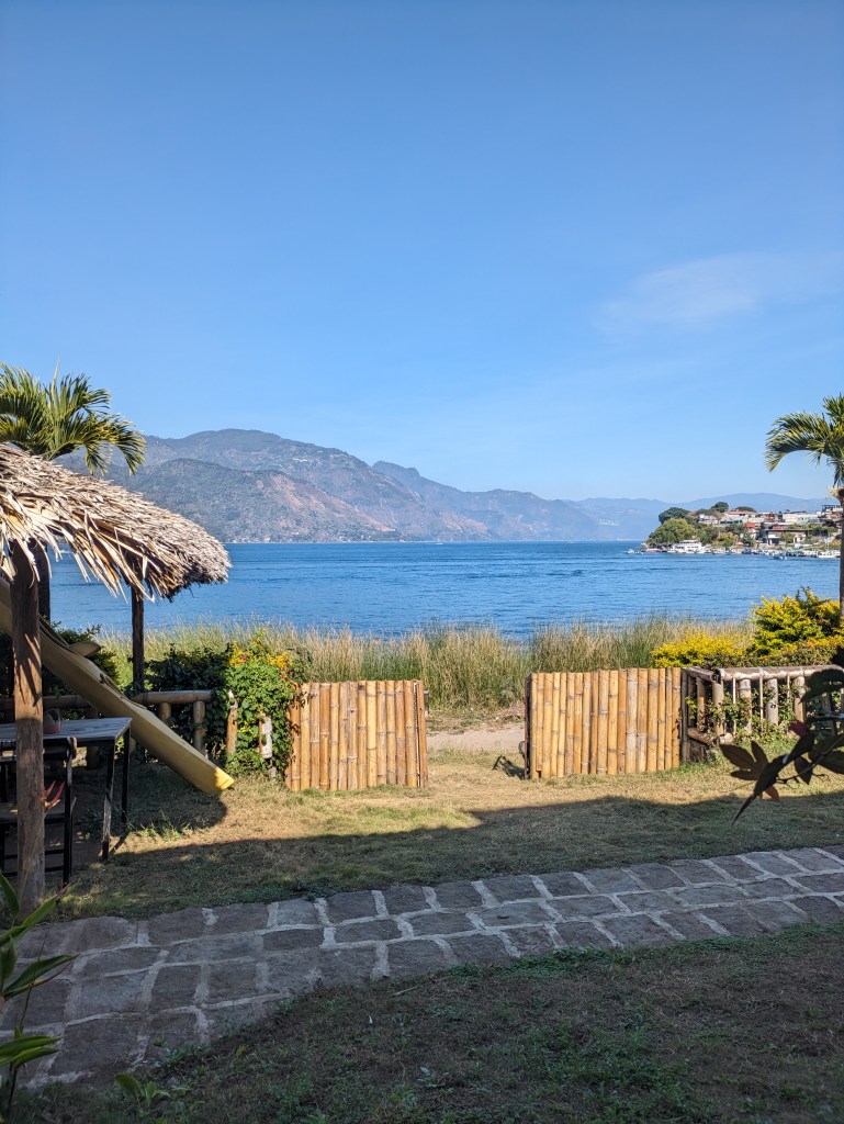 Lake Atitlan view from a lakeside café, an ideal work spot for digital nomads in Guatemala.