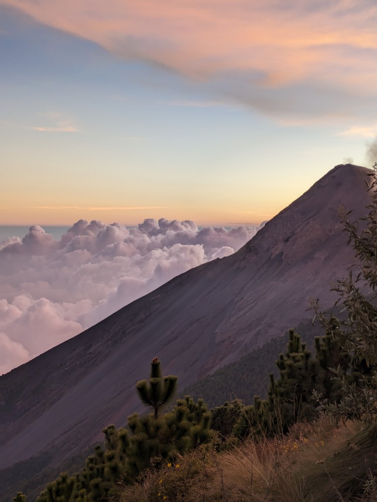 Sunrise view over the clouds from Acatenango Volcano, a challenging hike for digital nomads in Guatemala
