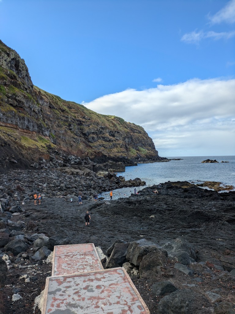 Natural thermal pools at Ferraria, a unique ocean-side spot for digital nomads in the Azores to relax.