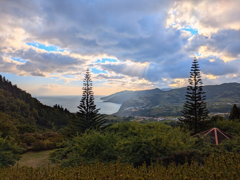 Sunset over the coastline and mountains, a scenic view for digital nomads in the Azores.