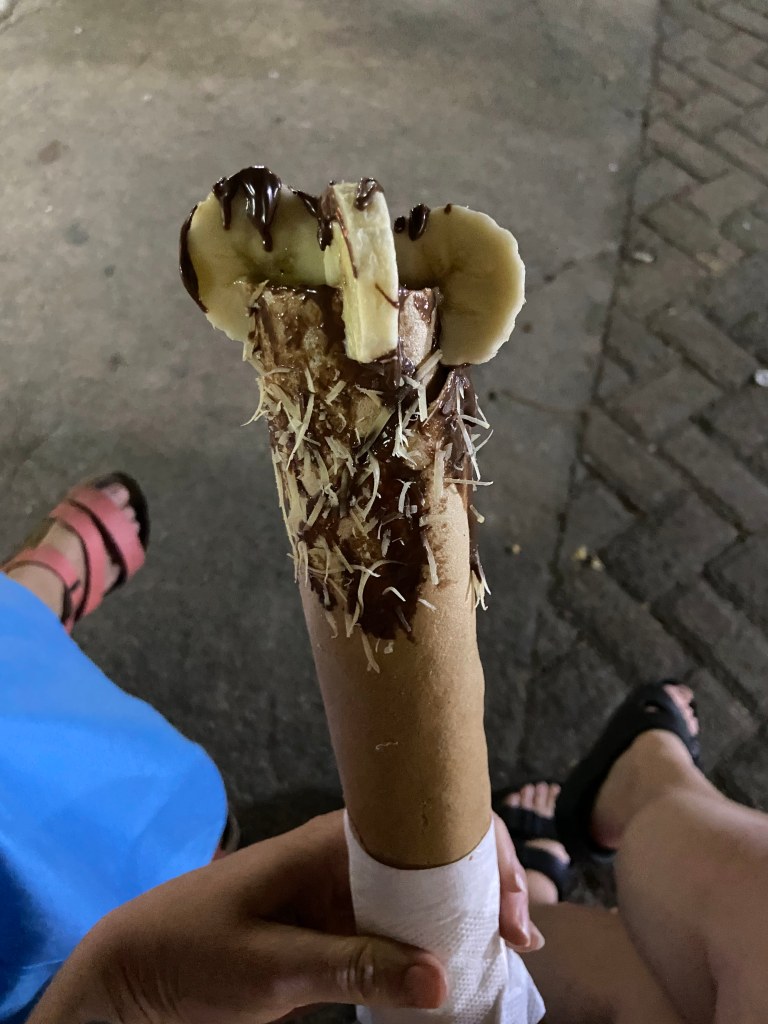 Digital Nomad in Mexico eating Marquesita