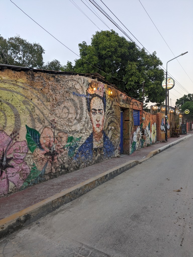 Digital Nomad in Mexico walking in Mexico City past Frida Kahlo