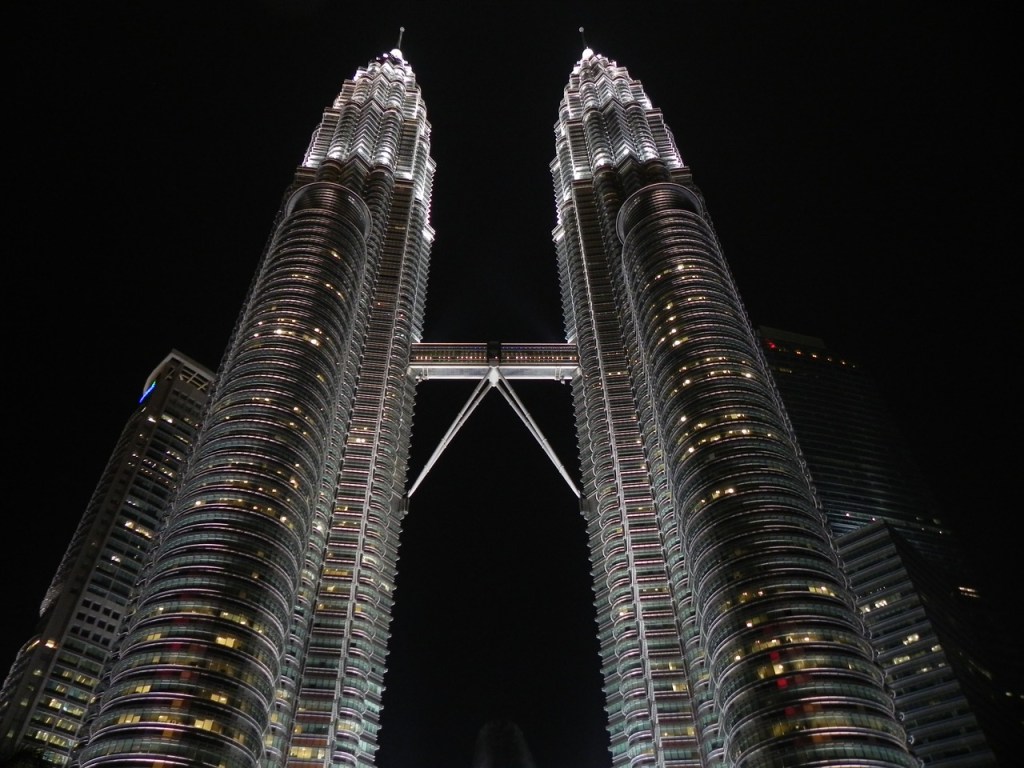 View of the Petronas Twin Towers at night, an iconic landmark in Kuala Lumpur for digital nomads in Malaysia
