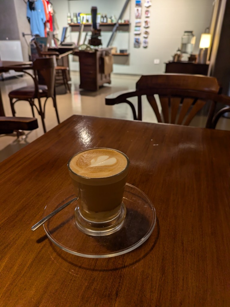 Digital nomad Tenerife Barraquito coffee at Café Breslau in La Orotava, a charming old town perfect for remote work.