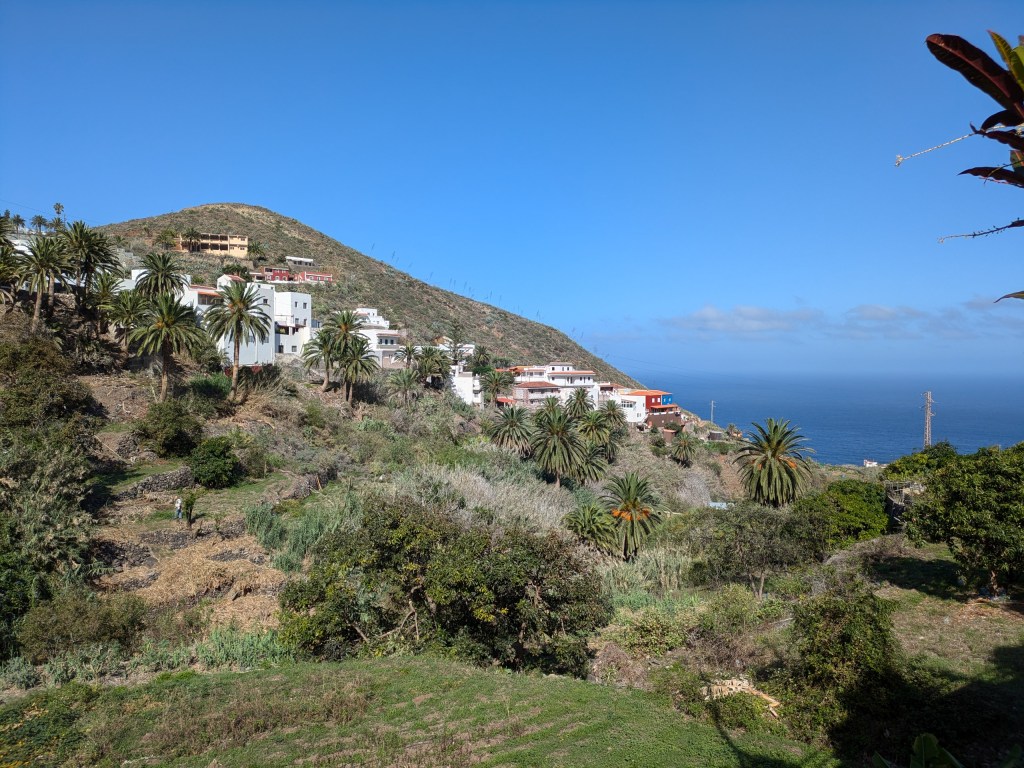Digital nomad Tenerife Charming whitewashed houses in Taganana, nestled in the lush Anaga Rural Park.