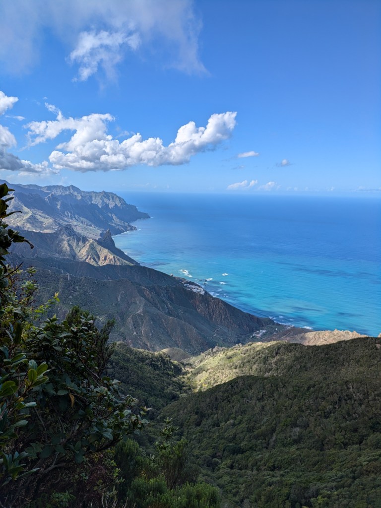 Digital nomad Tenerife Panoramic view of Anaga cliffs and the Atlantic Ocean, accessible via scenic hiking trails.