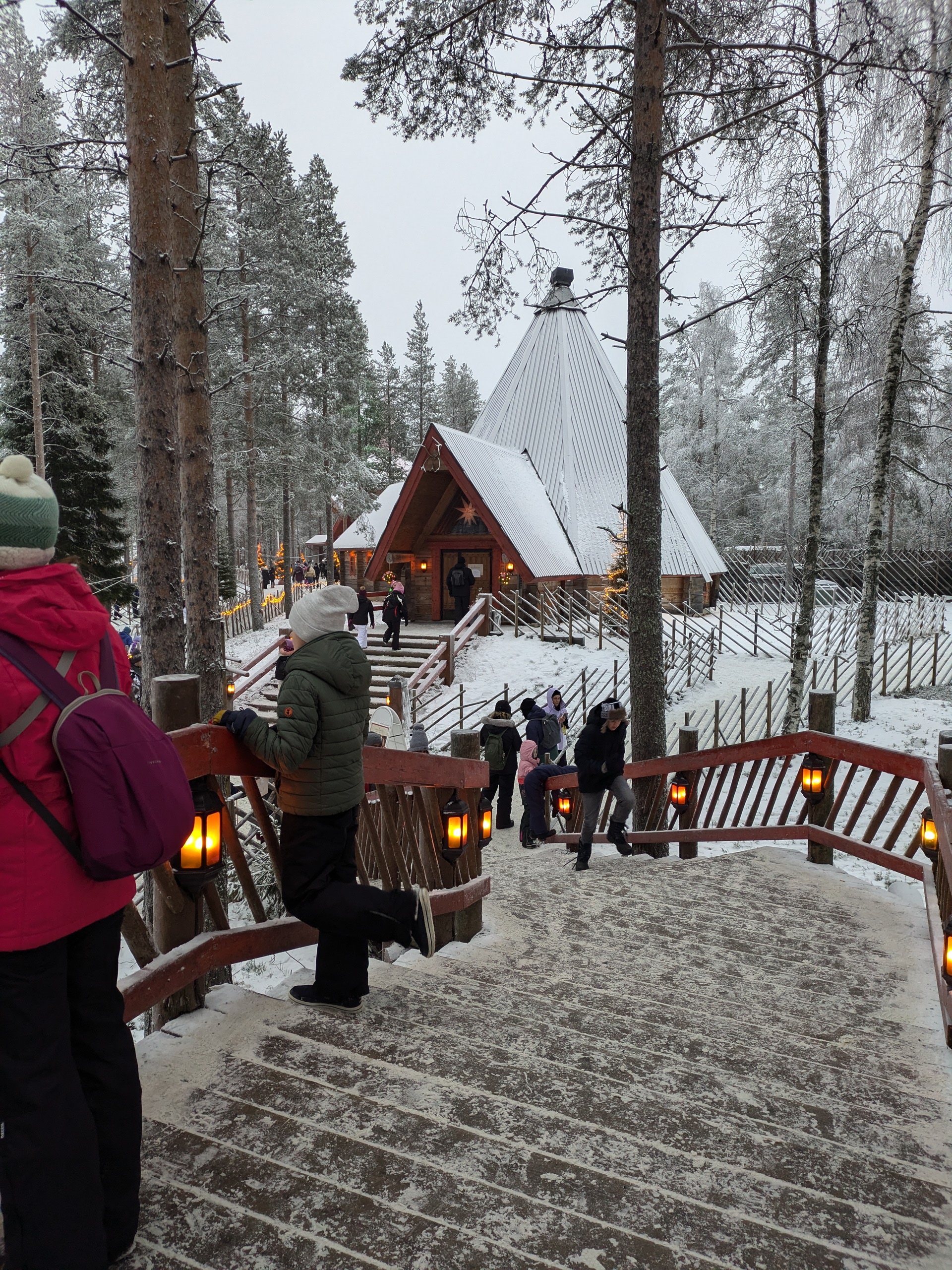 Wooden steps leading to Mrs. Claus’s House in Santa Claus Village, Rovaniemi, Lapland, Finland.