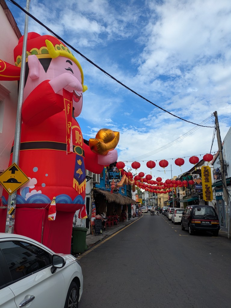 Digital Nomad Malaysia enjoying old Town of George Town with Chinese New Year decorations