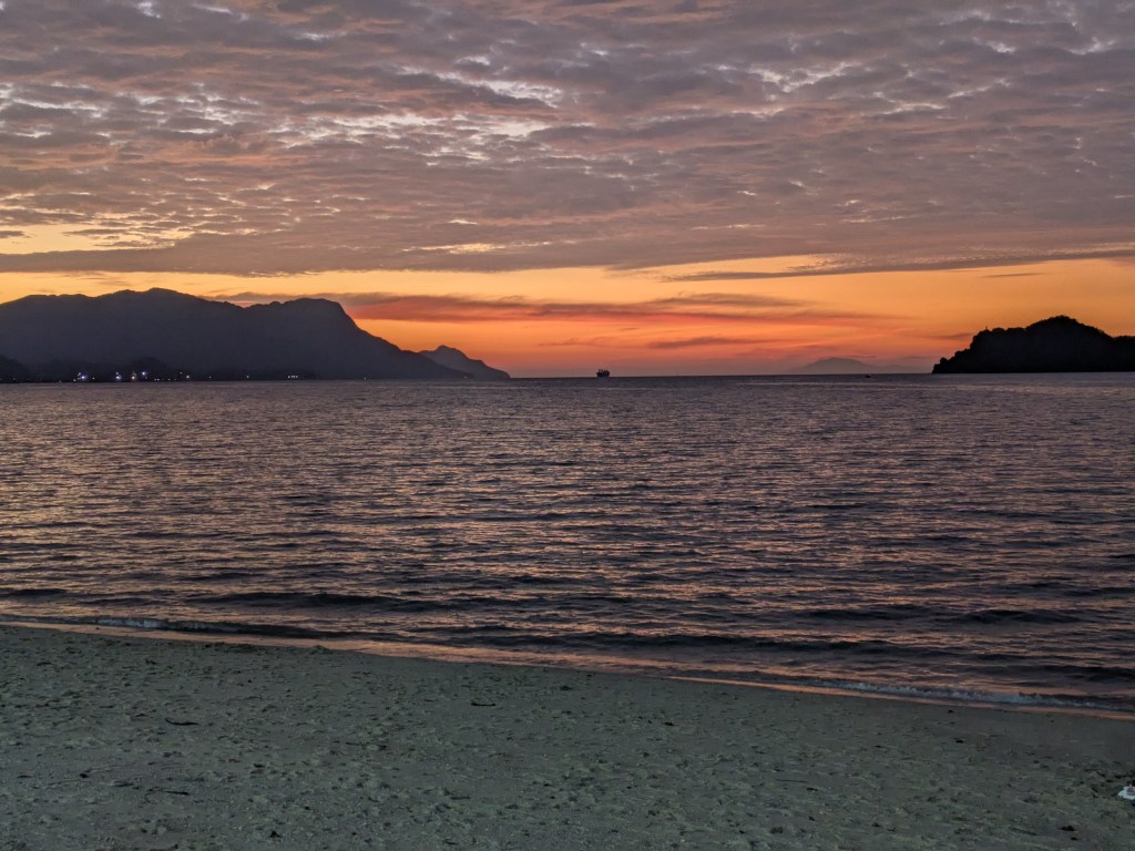 digital nomads in Malaysia enjoy sunsets in Tanjung Rhu beach
