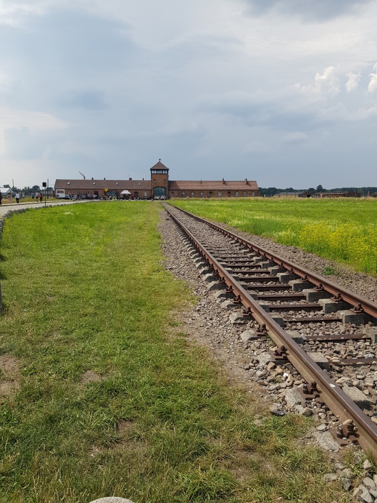 Train tracks leading to Auschwitz-Birkenau extermination camp - day trip from Krakow for digital nomads