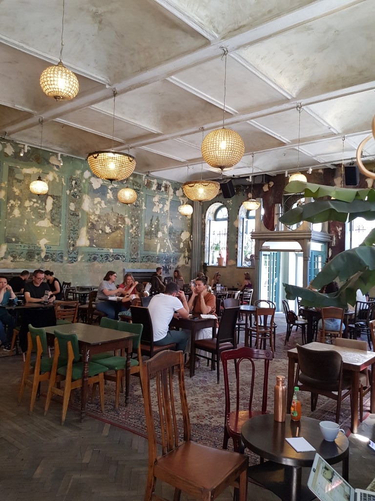 Trendy café with work-friendly tables in Kraków's Kazimierz district for digital nomads